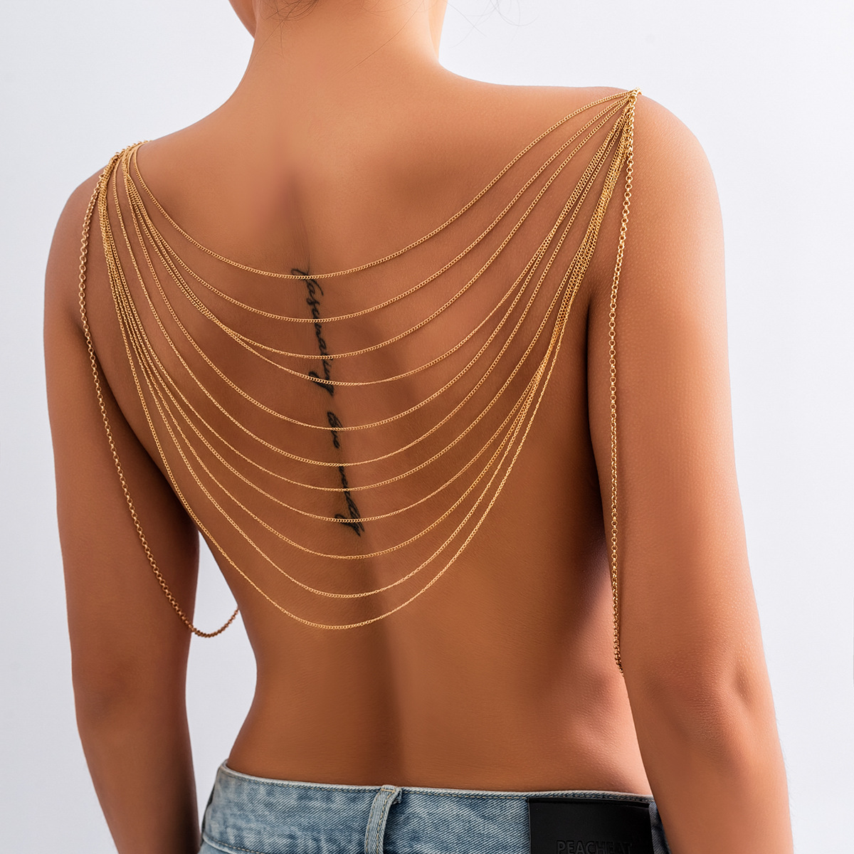Chaîne de corps à pampilles mu - Body Jewelry Chest avis et prix