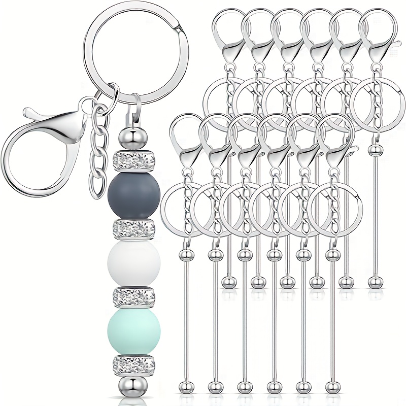 Lot de 12 porte-clés en fer dé - Body Jewelry Unique avis et prix